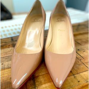 Christian Louboutin Kate Nude colored heels.